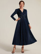 Load image into Gallery viewer, Gold | Wholesale Pricing Long Sleeve High Stretch A-Line Tea Length Knot Detail Wedding Guest Dresses